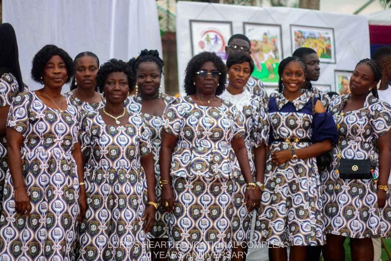 Group portrait of Lord’s Heart staff in matching school attire